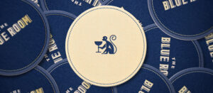 coaster design featuring icon for The Blue Room by Alfredo Muccino, Solid Branding